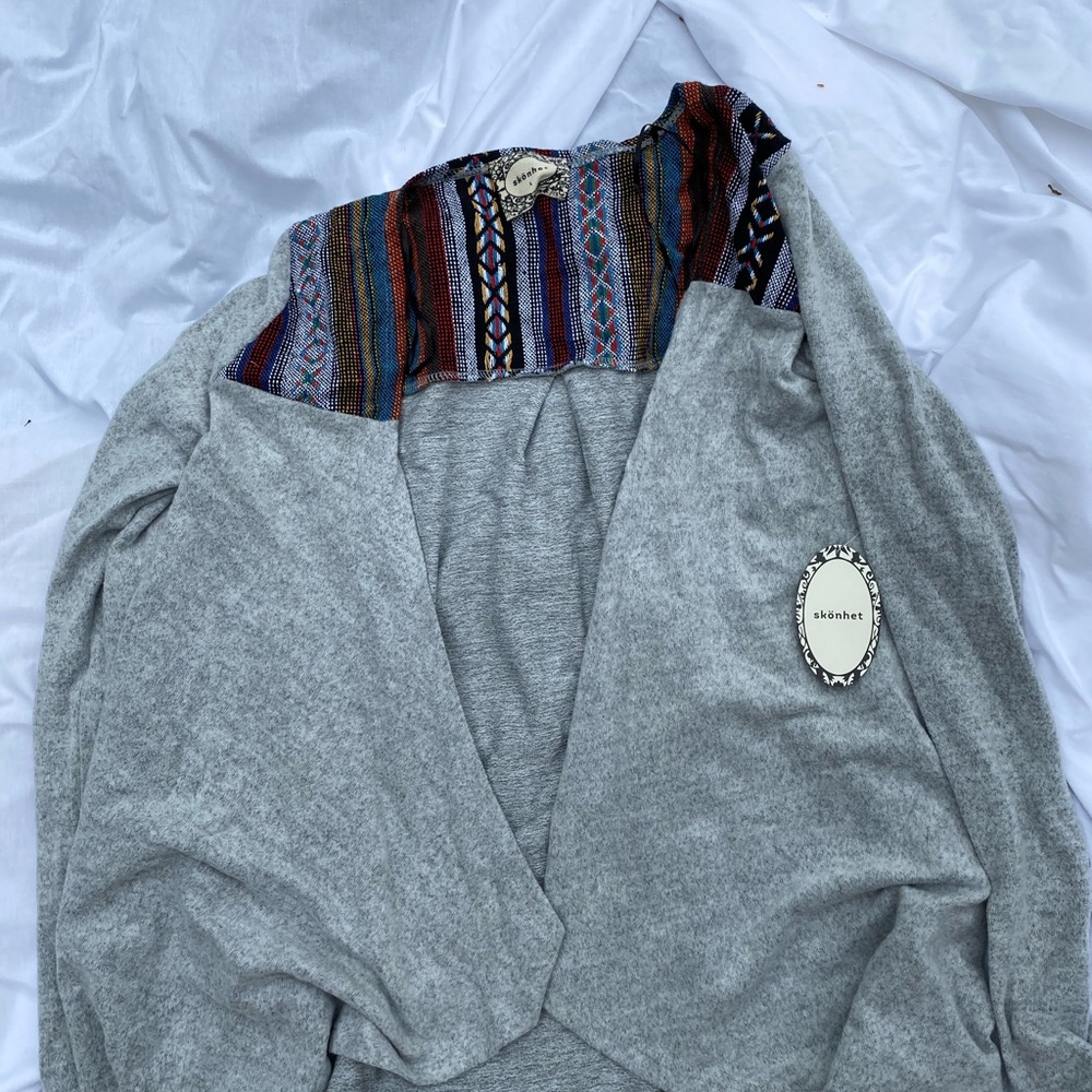 Gray cardigan sweater with embroidery on top